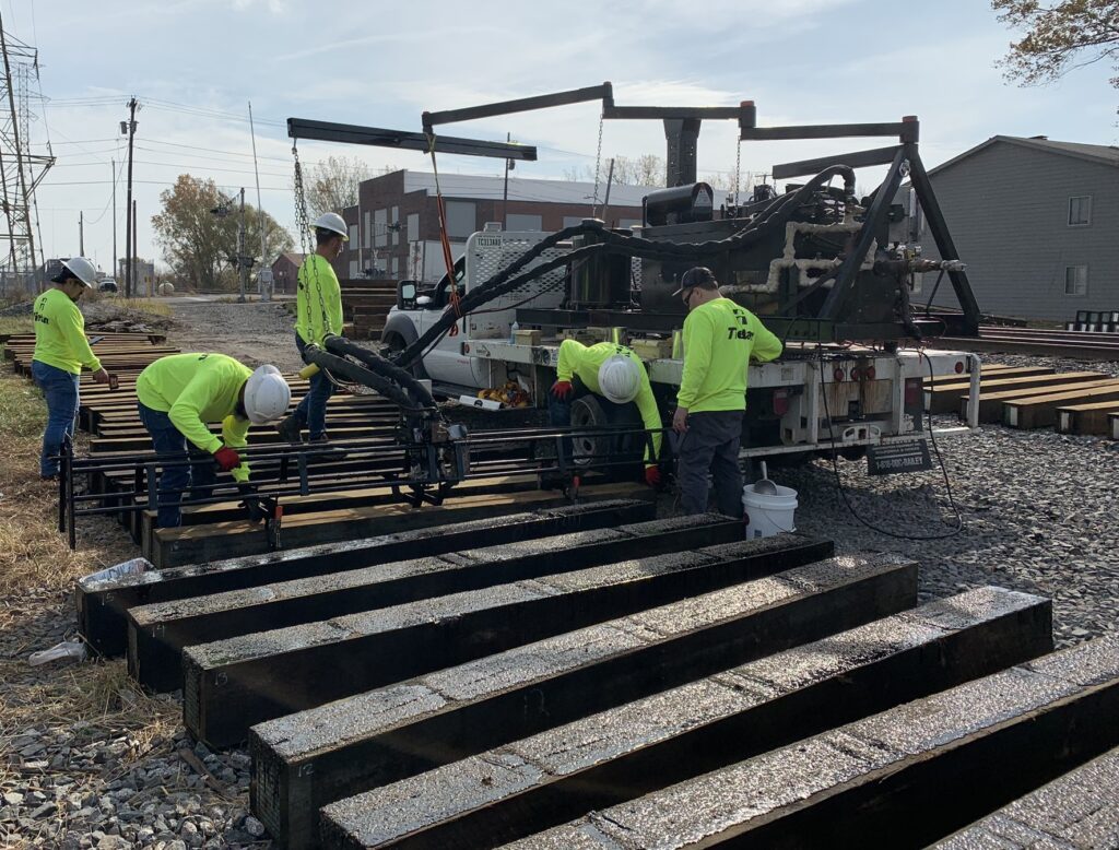 Out-of-track Bridge Tie Application. Crossties can be coated in-track or at a tie manufacturing facility.